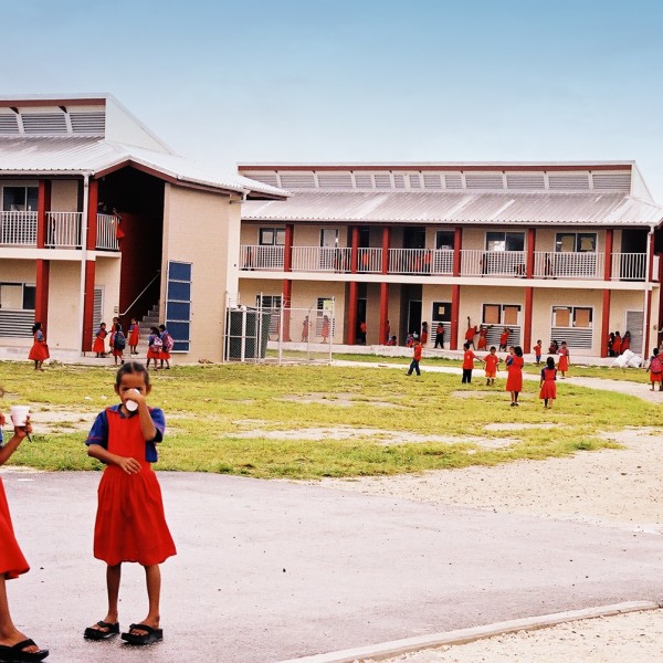 Marshallese students in front of their new school